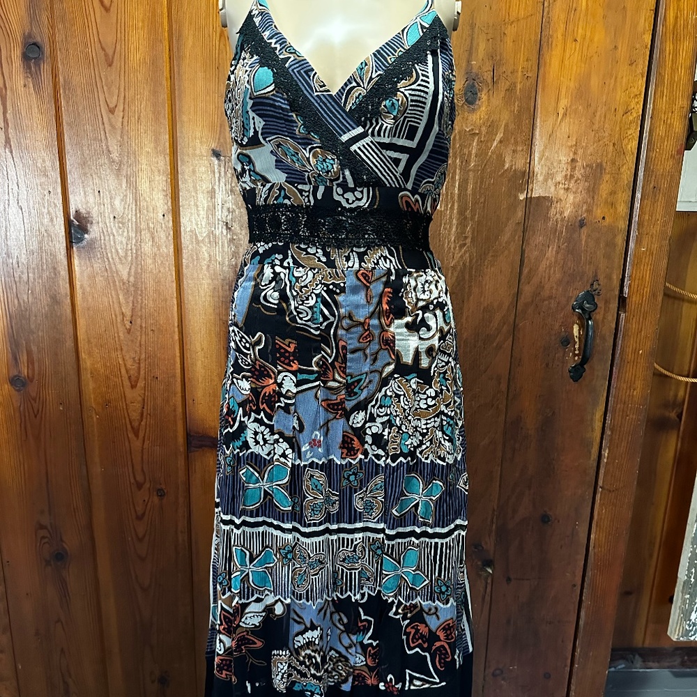 Beautiful pleated silk slip dress with unique pattern and trim